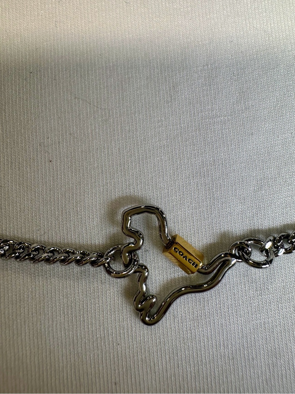 COACH
Two-Tone Signature Carabiner Rexy Pendant Necklace. New with tag . - Picture 6 of 8